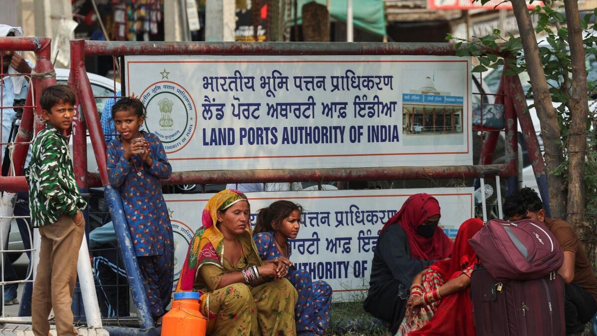 <div class="paragraphs"><p>Pakistani citizens take shelter under a tree as they wait to leave for Pakistan at the Attari-Wagah border crossing with Pakistan, near Amritsar.</p></div>