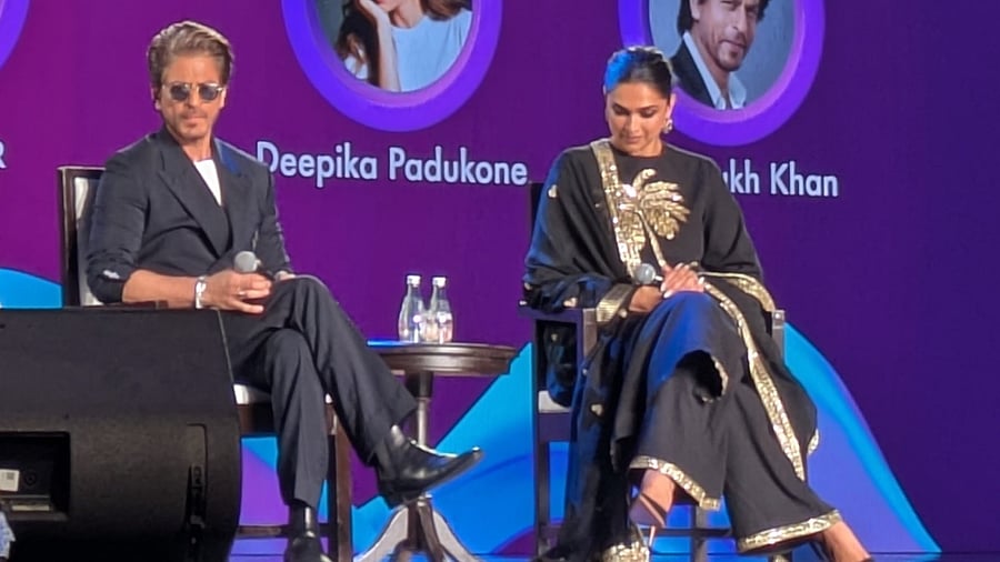 <div class="paragraphs"><p>Shah Rukh Khan and Deepika Padukone on stage in WAVES.</p></div>