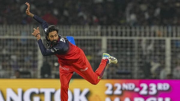 <div class="paragraphs"><p>Royal Challengers Bengaluru's Krunal Pandya bowls during the Indian Premier League cricket match between Kolkata Knight Riders and Royal Challengers Bengaluru</p></div>