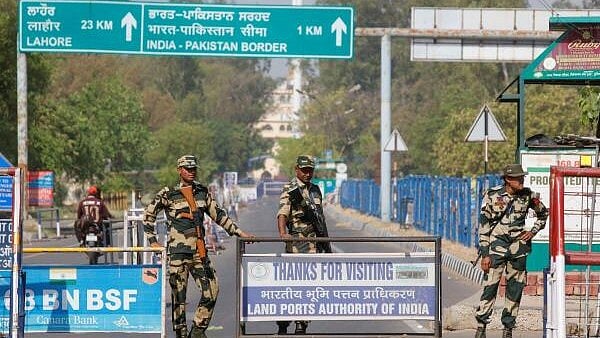 <div class="paragraphs"><p>Border Security Force (BSF) security personnel stand guard at the Attari-Wagah crossing on the India-Pakistan border in Amritsar.</p></div>