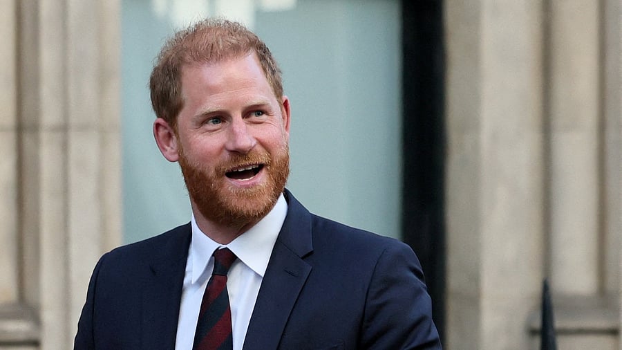 FILE PHOTO: Britain's Prince Harry departs after attending court for his appeal against the rejection of his legal challenge to the British government's decision to take away his police protection when he is in Britain, outside the High Court in London, Britain, April 9, 2025. REUTERS/Isabel Infantes/File Photo