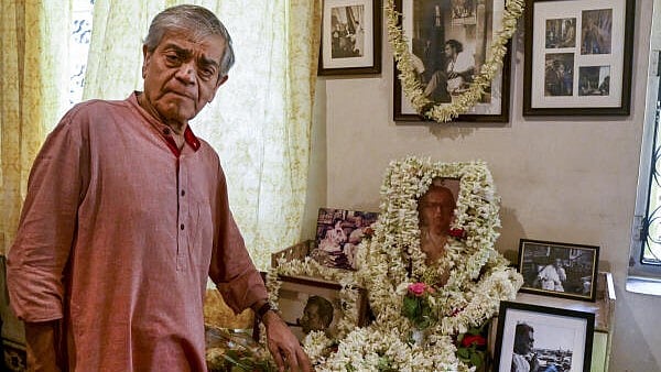<div class="paragraphs"><p>Sandip Ray, film director and son of legendary film director Satyajit Ray, pays tribute to his father on his birth anniversary, at his residence in Kolkata</p></div>