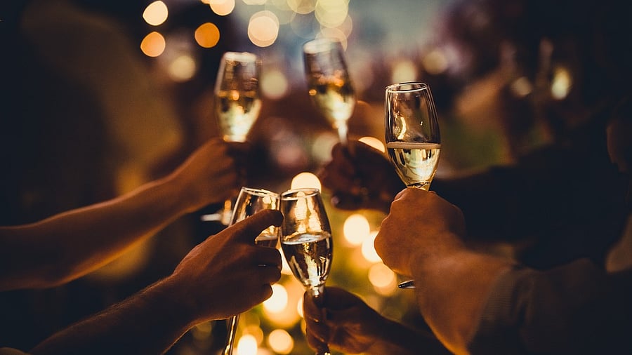 <div class="paragraphs"><p>People clinking glasses of champagne. </p><p>Representational photo</p></div>