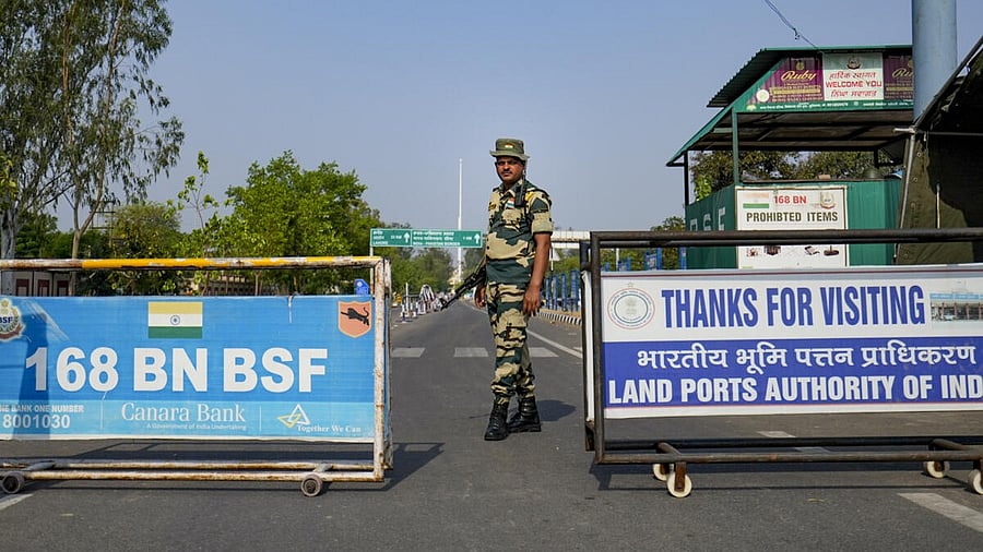 <div class="paragraphs"><p> A security personnel stands guard at the Attari-Wagah border, near Amritsar.</p></div>
