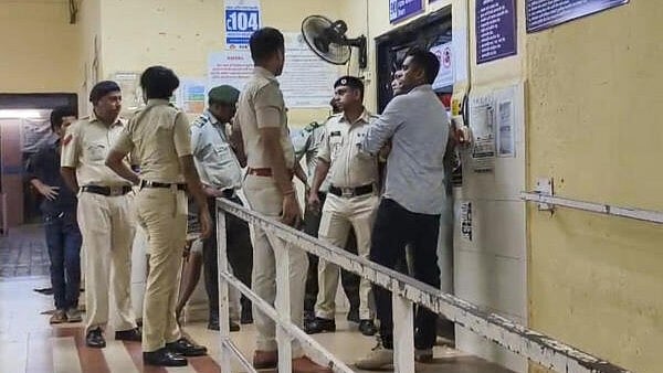 <div class="paragraphs"><p>Police personnel at a hospital where injured being treated after a stampede during a temple festival, in Shirgao village, around 40 km away from Panaji, Goa, Saturday, May 3, 2025. At least seven persons were killed and 30 sustained injuries after a stampede broke out at the Sree Lairai Devi temple in North Goa. </p></div>