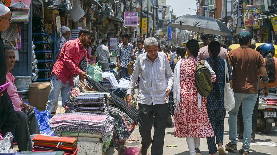 <div class="paragraphs"><p>With no designated vending zones, vendors spill onto pedestrian paths.</p></div>