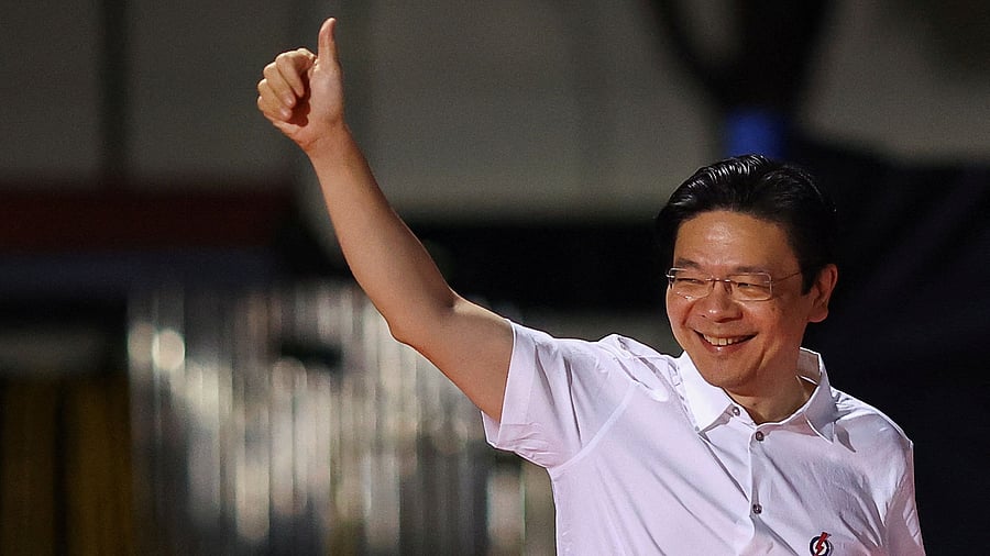 <div class="paragraphs"><p>Singapore's Prime Minister Lawrence Wong arrives at an assembly area for People's Action Party supporters, on the day of the general election in Singapore, May 3, 2025. </p></div>