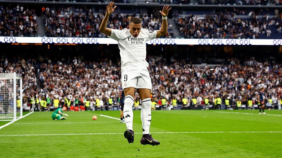 <div class="paragraphs"><p>Real Madrid's Kylian Mbappe celebrates scoring their third goal. </p></div>