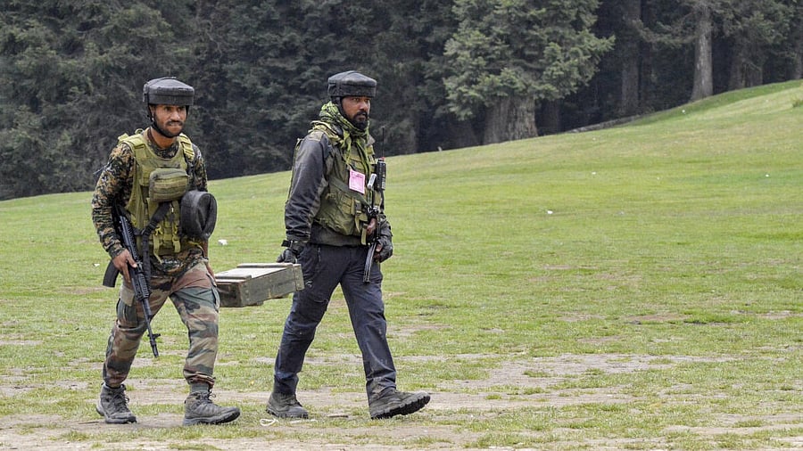 <div class="paragraphs"><p>Security personnel at Pahalgam terror attack site.</p></div>