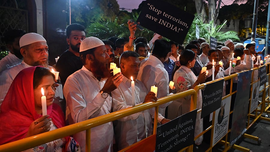 <div class="paragraphs"><p>People at the candlelight vigil at Millers Road on Sunday. </p></div>