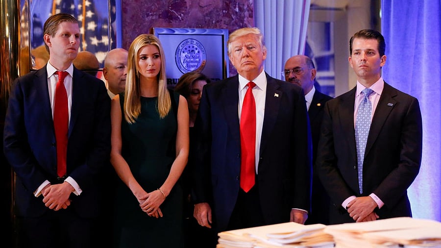 <div class="paragraphs"><p> US President Donald Trump stands surrounded by his son Eric Trump, daughter Ivanka and son Donald Trump Jr.</p></div>