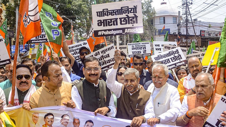 <div class="paragraphs"><p>Jharkhand BJP President Babulal Marandi along with party leaders stages a protest against Pakistan, in Ranchi.</p></div>