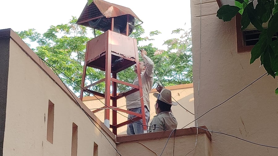 <div class="paragraphs"><p>Personnel inspect the air raid siren at Vyalikaval Police Station, Bengaluru. </p></div>
