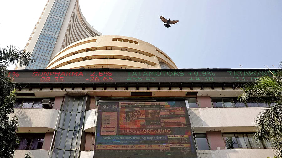 <div class="paragraphs"><p>FILE PHOTO: A bird flies past a screen displaying the Sensex results on the facade of the Bombay Stock Exchange (BSE) building in Mumbai</p></div>