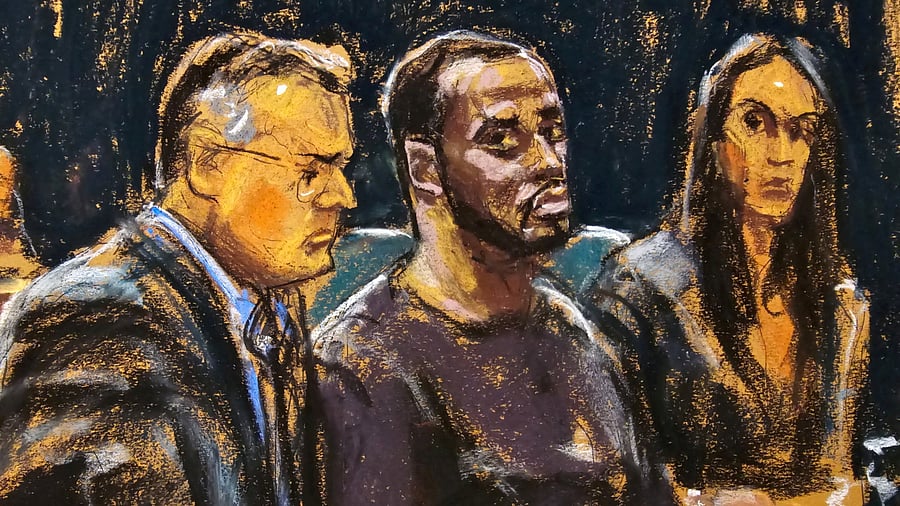 <div class="paragraphs"><p>Sean "Diddy" Combs and his defense lawyers.</p></div>