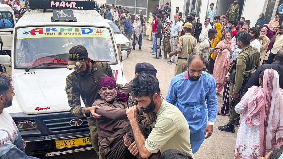 <div class="paragraphs"><p>An injured being brought for treatment at a hospital after a bus skidded off the road and plunged into a gorge, at Mendhar in Poonch district</p></div>