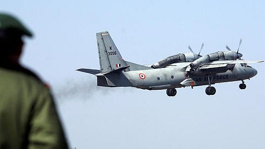 <div class="paragraphs"><p>A soldier stands guard as an Indian Air Force AN-32 transport aircraft carrying security personnel takes-off. (Representational picture)</p></div>