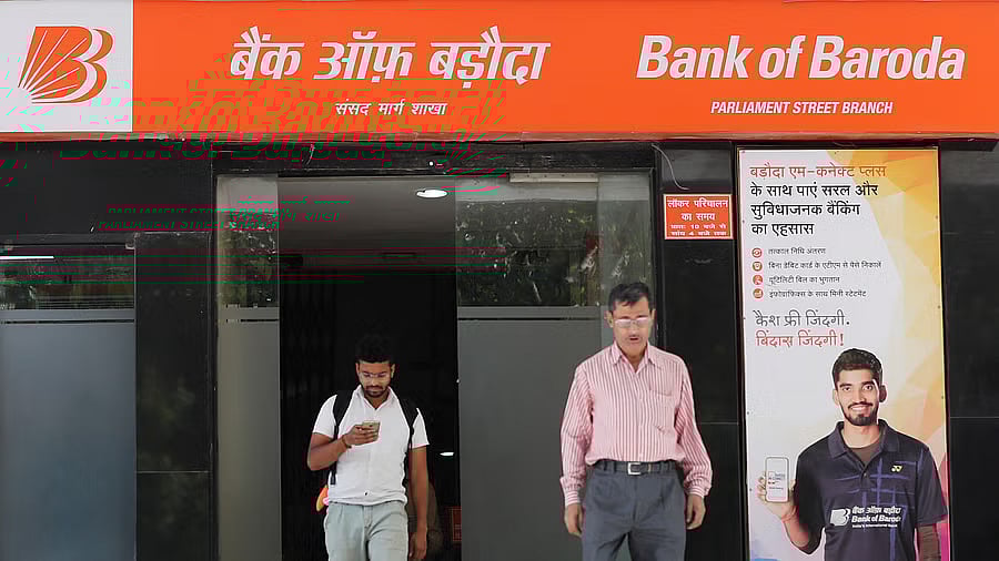 <div class="paragraphs"><p>Photo for representational purpose: People walk out from the Bank of Baroda branch. </p></div>