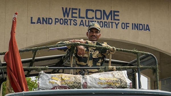 <div class="paragraphs"><p>A Border Security Force (BSF) official stands guard at the Attari-Wagah Border, in Amritsar district, Punjab, Wednesday, May 7, 2025. In retaliation for the Pahalgam terror attack, Indian armed forces early Wednesday carried out missile strikes on nine terror targets in Pakistan and Pakistan-occupied Kashmir (PoK), including the Jaish-e-Mohammad stronghold of Bahawalpur and Lashkar-e-Taiba's base in Muridke.</p></div>