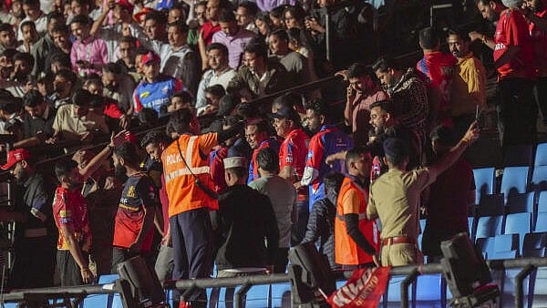 <div class="paragraphs"><p>Spectators being asked to leave by officials after the Indian Premier League (IPL) 2025 T20 cricket match between Punjab Kings and Delhi Capitals was suspended, at the HPCA Stadium, in Dharamsala on Thursday.</p></div>