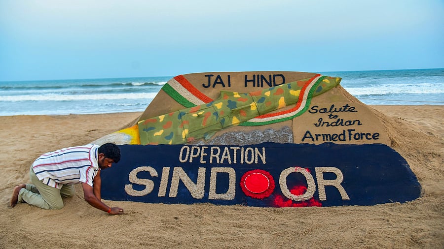 <div class="paragraphs"><p>Puri: Sand artist Sudarsan Pattnaik creates a sand sculpture celebrating the Indian armed forces' missile strikes on terror targets in Pakistan and Pakistan-occupied Kashmir (PoK) under 'Operation Sindoor', in retaliation to the Pahalgam terror attack, at Puri beach, Odisha.</p></div>