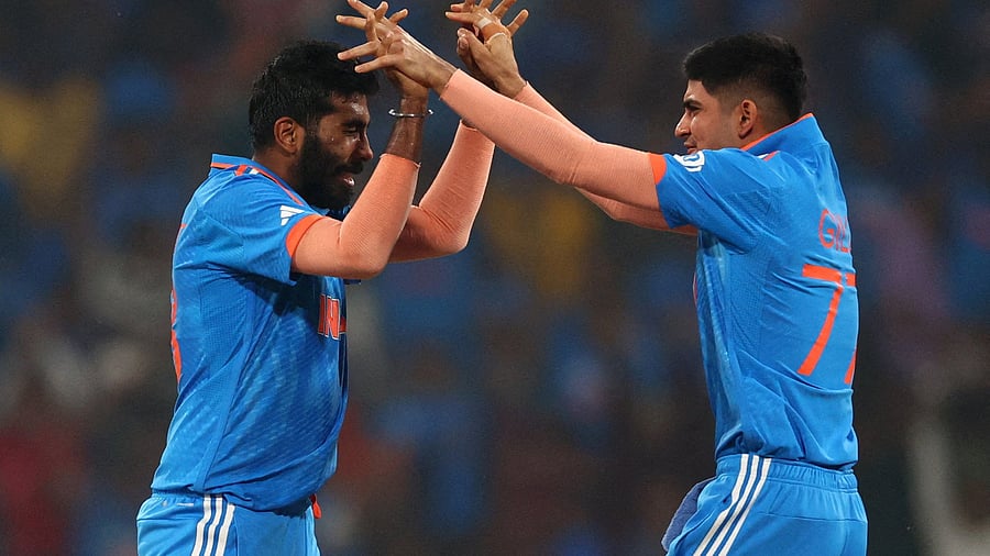<div class="paragraphs"><p>Jasprit Bumrah celebrates with Shubman Gill.</p></div>