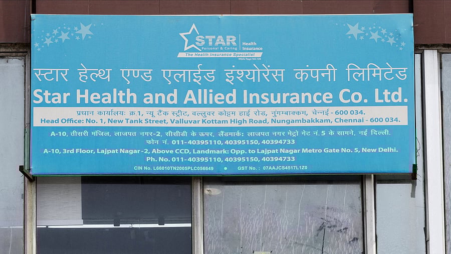 <div class="paragraphs"><p>An employee of Star Health sits inside their office in New Delhi, India.</p></div>