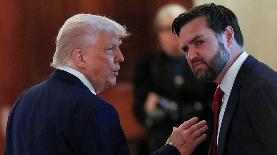 <div class="paragraphs"><p>US President Donald Trump talks with Vice President JD Vance.</p></div>