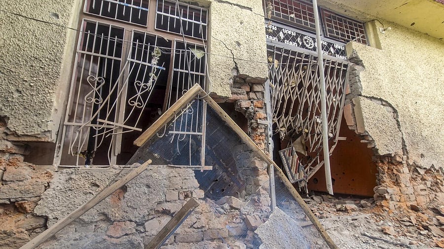 <div class="paragraphs"><p>A property damaged after heavy firing and shelling by Pakistan military overnight across the Line of Control and International Border, in Rajouri </p></div>