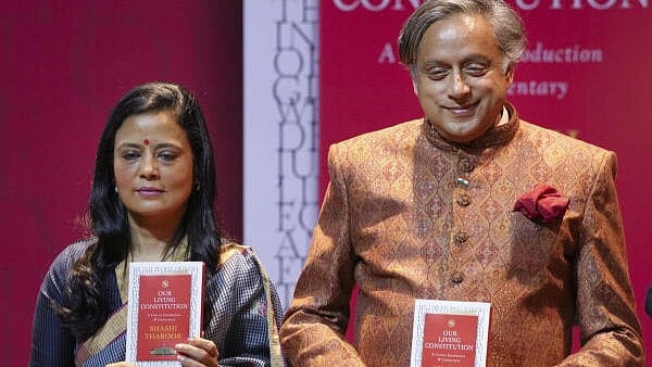 <div class="paragraphs"><p>Congress leader Shashi Tharoor with TMC leader Mahua Moitra during the launch of his book, 'Our Living Constitution: A Concise Introduction &amp; Commentary', in New Delhi.</p></div>