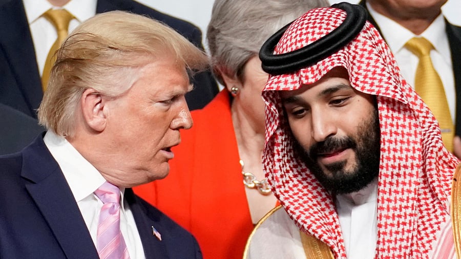 <div class="paragraphs"><p>US President Donald Trump speaks with Saudi Arabia's Crown Prince Mohammed bin Salman.</p></div>