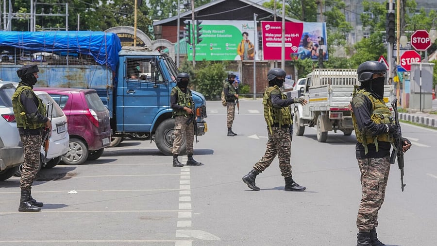 <div class="paragraphs"><p>Security personnel keep vigil, seen a day after India and Pakistan reached a bilateral understanding, in Srinagar, Sunday, May 11, 2025.</p></div>