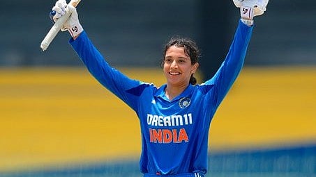<div class="paragraphs"><p>Smriti Mandhana celebrating after scoring a century.</p></div>