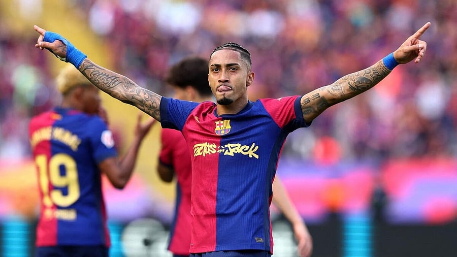 <div class="paragraphs"><p>FC Barcelona's Raphinha celebrates scoring their fourth goal.</p></div>