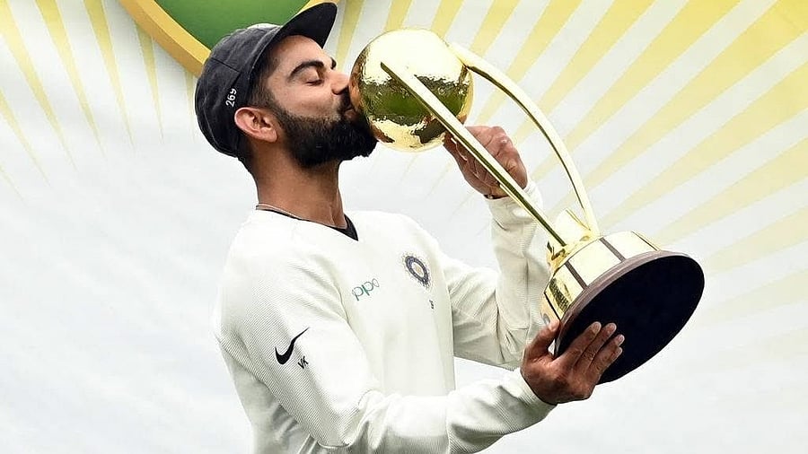 <div class="paragraphs"><p>Virat Kohli kisses the Border-Gavaskar trophy as the Indian team celebrates their series win on the fifth day of the fourth and final cricket Test against Australia at the Sydney Cricket Ground in Sydney on January 7, 2019.</p></div>