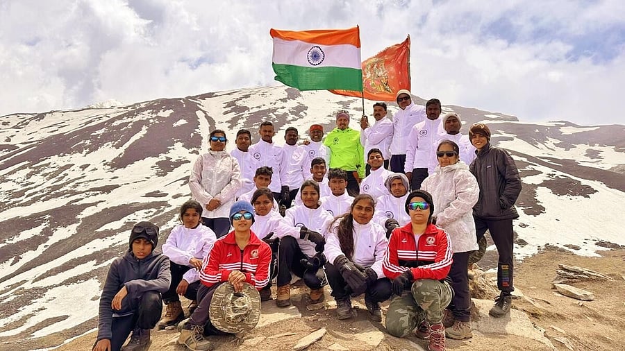 <div class="paragraphs"><p>Trekkers, including children of pourakarmikas of Mysuru and elephant caretakers, at the summit of Mt Kuari Top, at an altitude of 13,990 feet in Chamoli district of Uttarakhand, in the Himalayas, under project Junoon 2025, to mark May Day. </p></div>