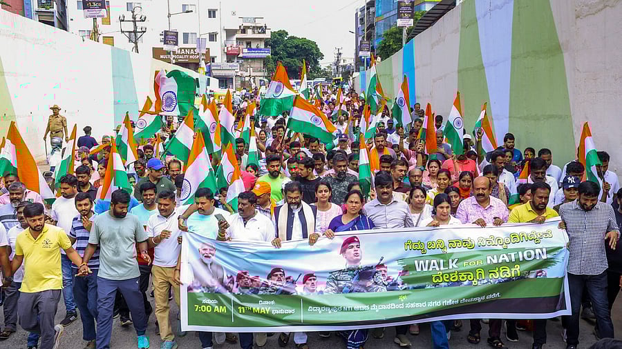 <div class="paragraphs"><p>Union Minister Shobha Karandlaje and leader of the Opposition in the Council Chalavadi Narayanaswamy lead a rally in support of 'Operation Sindoor,' in Bengaluru on Sunday. </p></div>