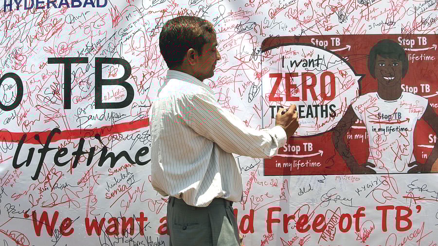 <div class="paragraphs"><p>A volunteer signing the signature campaign poster, during the TB awareness program</p></div>