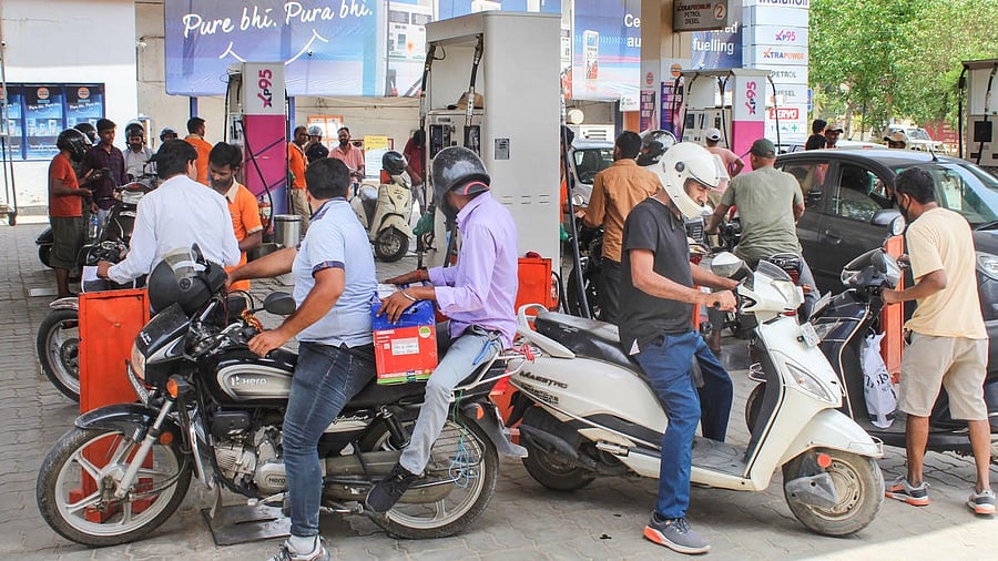 <div class="paragraphs"><p>People get their vehicles filled with fuel at a petrol pump. Image for representation.</p></div>
