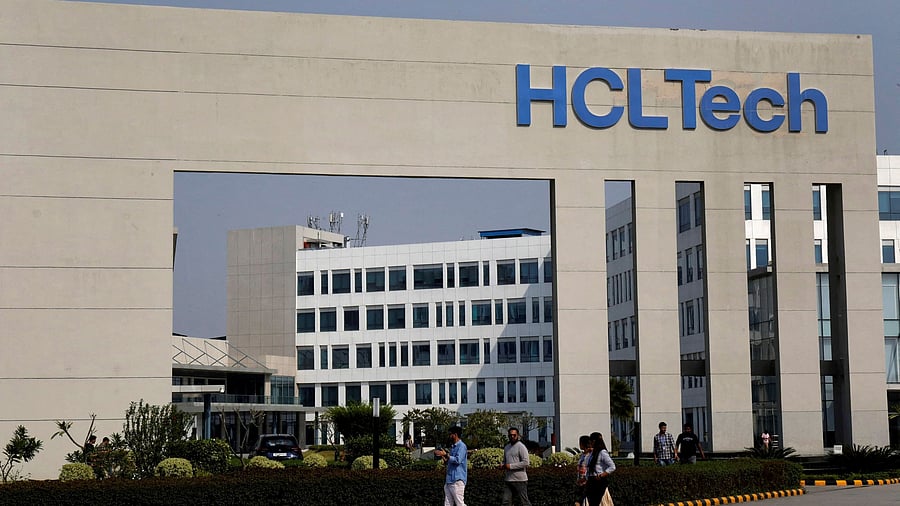 <div class="paragraphs"><p>Employees of HCLTech walk inside the office premises on the outskirts of Lucknow, India. </p></div>