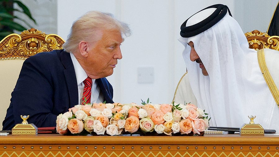 <div class="paragraphs"><p>US President Donald Trump and Qatar's Emir Tamim bin Hamad Al Thani attend a signing ceremony in Doha, Qatar.</p></div>