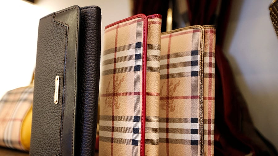 <div class="paragraphs"><p>FILE PHOTO: Burberry wallets are seen on display at a Burberry store in Beijing.</p></div>