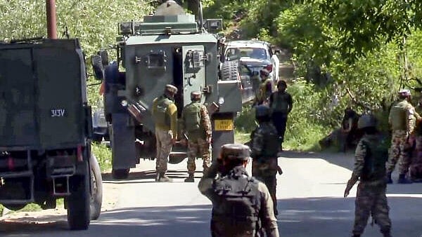 <div class="paragraphs"><p>Security personnel undertake a cordon and search operation after getting specific input about the presence of terrorists, at Tral area of Awantipora, in Pulwama district of Jammu and Kashmir, on Thursday.</p></div>