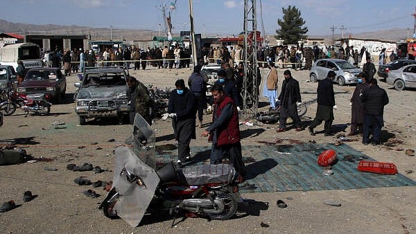 <div class="paragraphs"><p>File Photo showing members of a bomb disposal squad examine the site of a blast in Khanozai, Balochistan, Pakistan.</p></div>