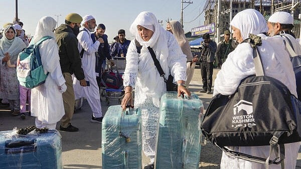 <div class="paragraphs"><p>Haj pilgrims leave for the airport from Haj House at Bemina, in Srinagar, Wednesday, May 14, 2025. Haj flights resumed from Srinagar a day after the airport was reopened following a temporary shutdown due to the recent conflict between India and Pakistan.</p></div>