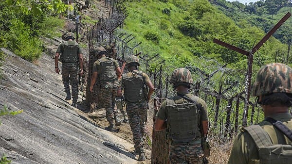 <div class="paragraphs"><p>Indian Army soldiers patrol near the Line of Control (LOC)</p></div>