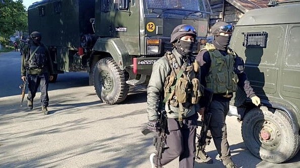 <div class="paragraphs"><p>Security personnel undertake a cordon and search operation after getting specific input about the presence of terrorists, at Nader Tral area of Awantipora, in Pulwama district</p></div>