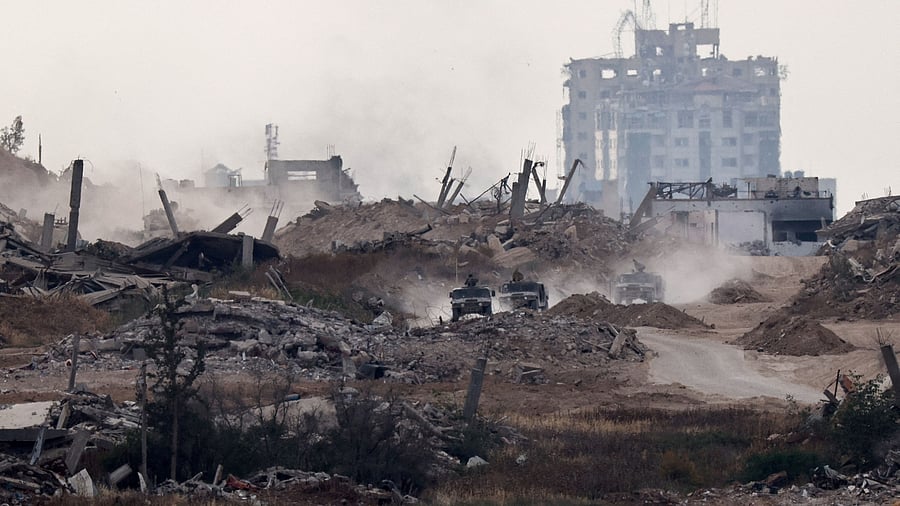 <div class="paragraphs"><p>A military convoy manoeuvres inside Gaza, as seen from Israel.</p></div>