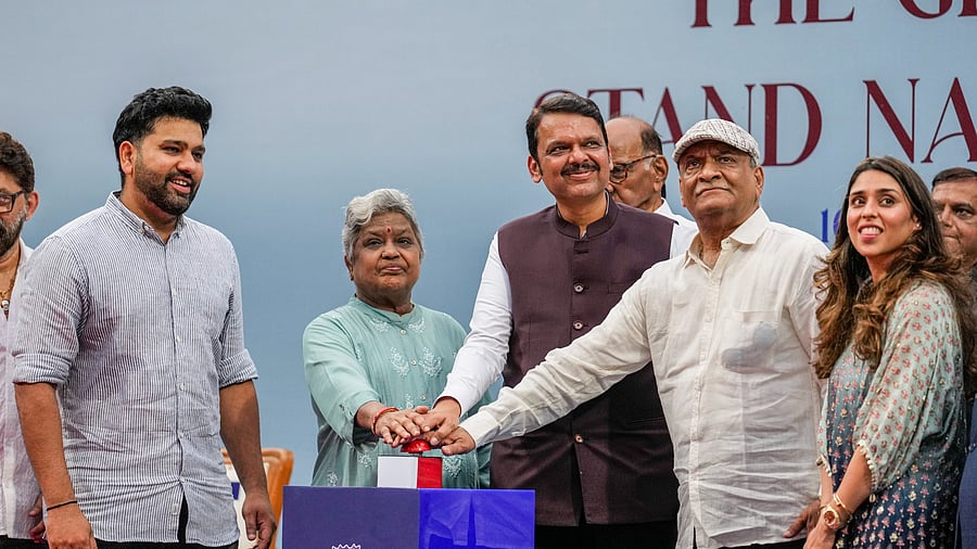 <div class="paragraphs"><p>Maharashtra Chief Minister Devendra Fadnavis and cricketer Rohit Sharma with wife Ritika and parents during the inauguration of Rohit Sharma Stand at the Wankhede Stadium, in Mumbai, Friday.</p></div>