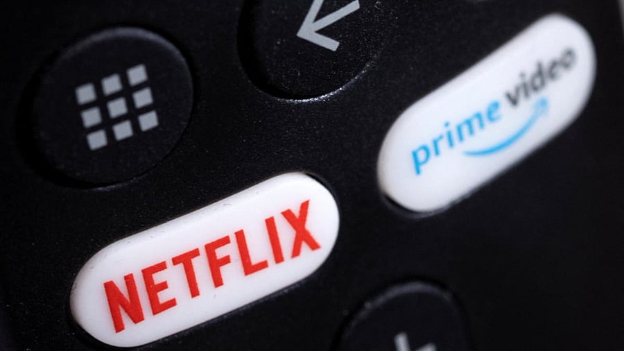 <div class="paragraphs"><p>Netflix and Prime video logos are seen on a TV remote controller in this illustration.</p></div>